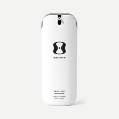 Skincare bottle labeled 'One Skin' on a beige background