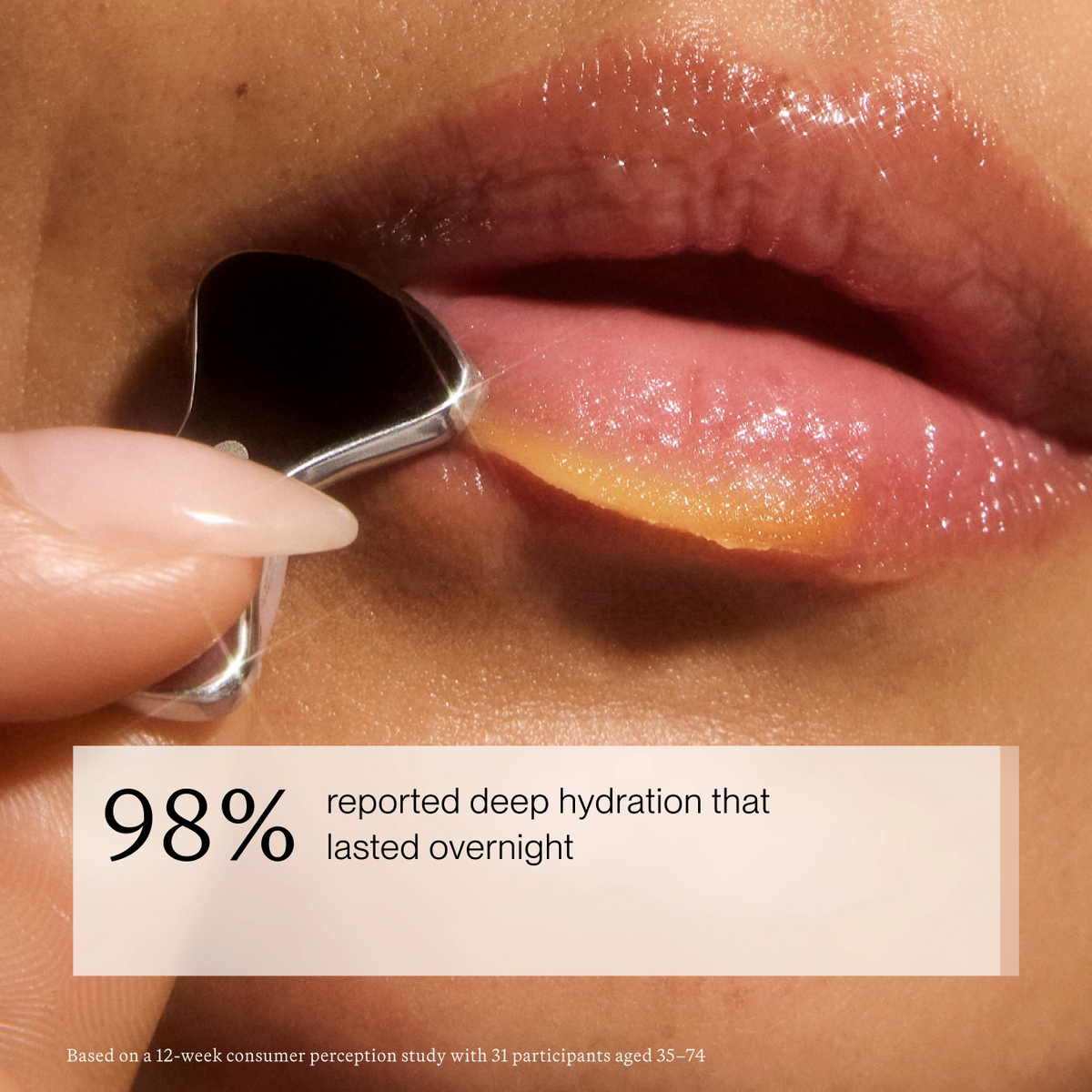 Close-up of glossy lips with a silver lip product applicator being pulled outward by a hand, plus a text overlay reading '98% reported deep hydration that lasted overnight'.