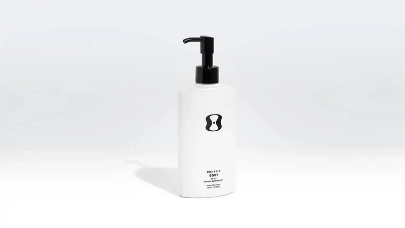 White bottle with black pump on a white background
