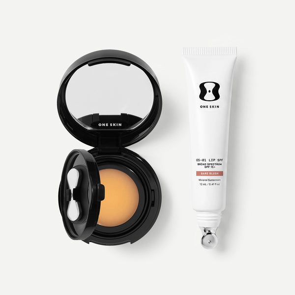 Skincare product packaging with black disc and white tube on a beige background