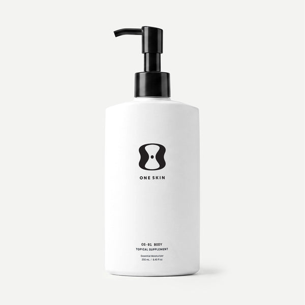 White bottle with black pump and 'One Skin' logo on a beige background