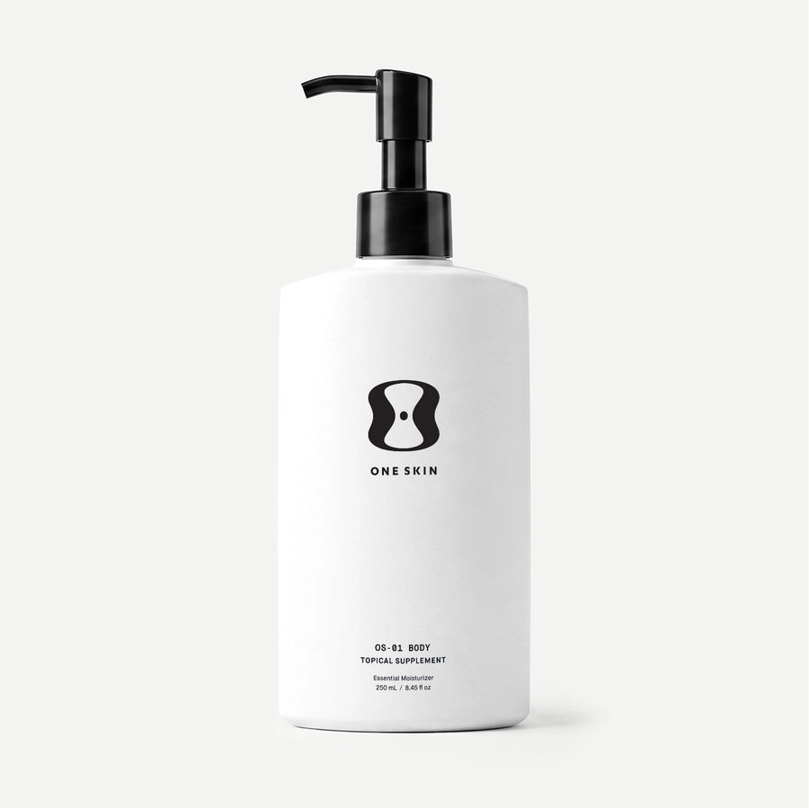 White bottle with black pump and 'One Skin' logo on a beige background