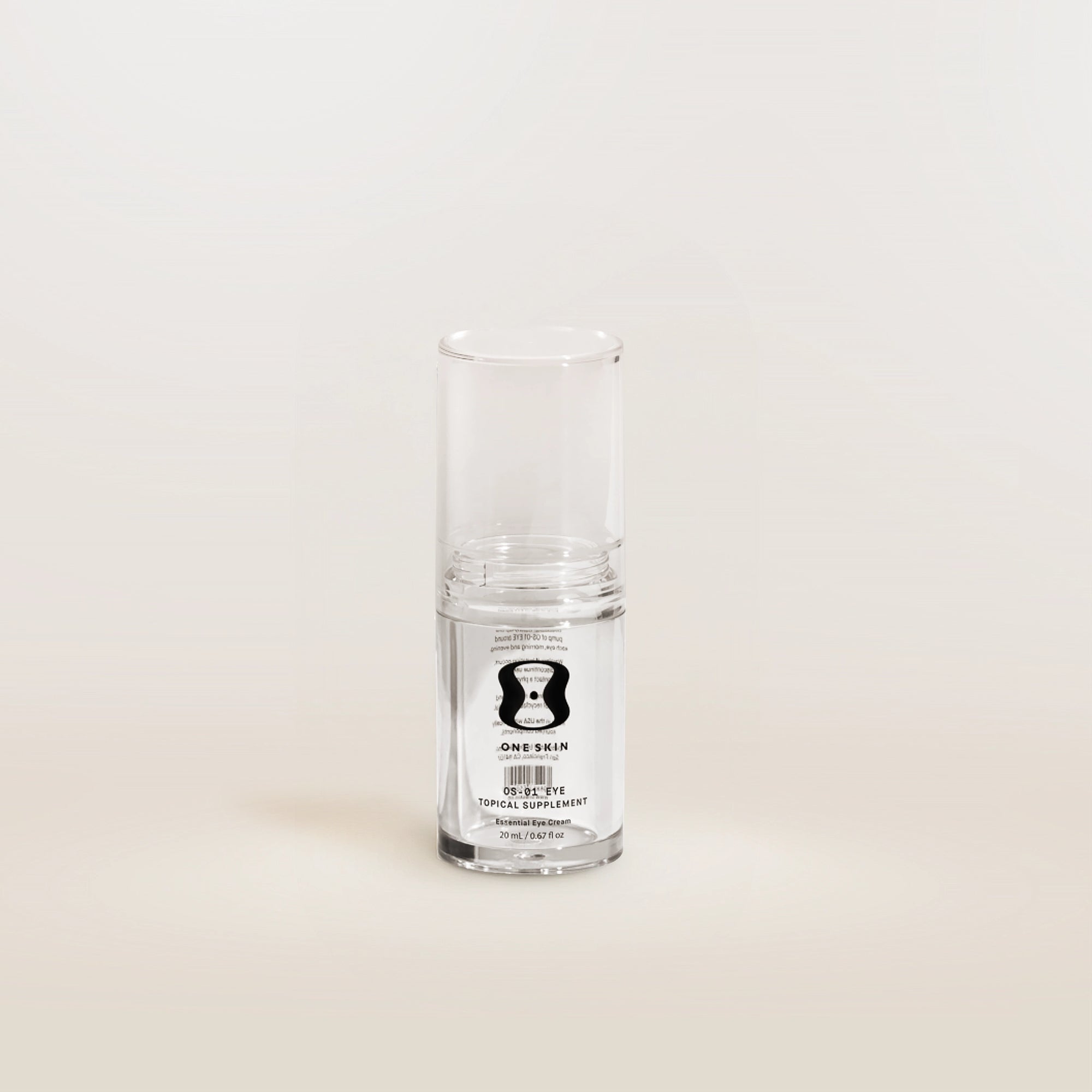 Clear glass supplement bottle with a label on a white background