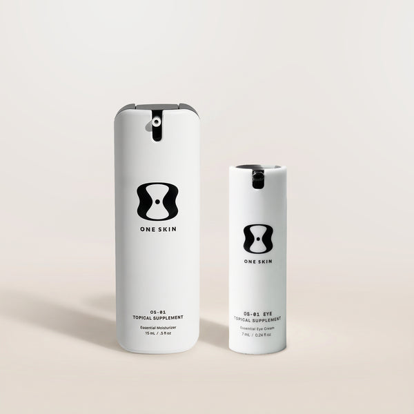 Two tubes of product with OneSkin branding on a beige background
