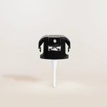 Black and white replacement pump on a beige background