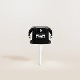 Black and white replacement pump on a beige background