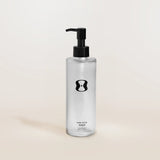 Bottle of 'One Skin Prep' on a beige background