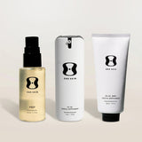 Three skincare products from the brand 'One Skin' on a light beige background.