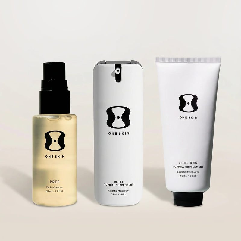 Three skincare products from the brand 'One Skin' on a light beige background.