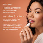 Woman applying lip balm with product features highlighted on a peach background
